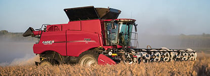 Case IH 7160 combine with Draper head