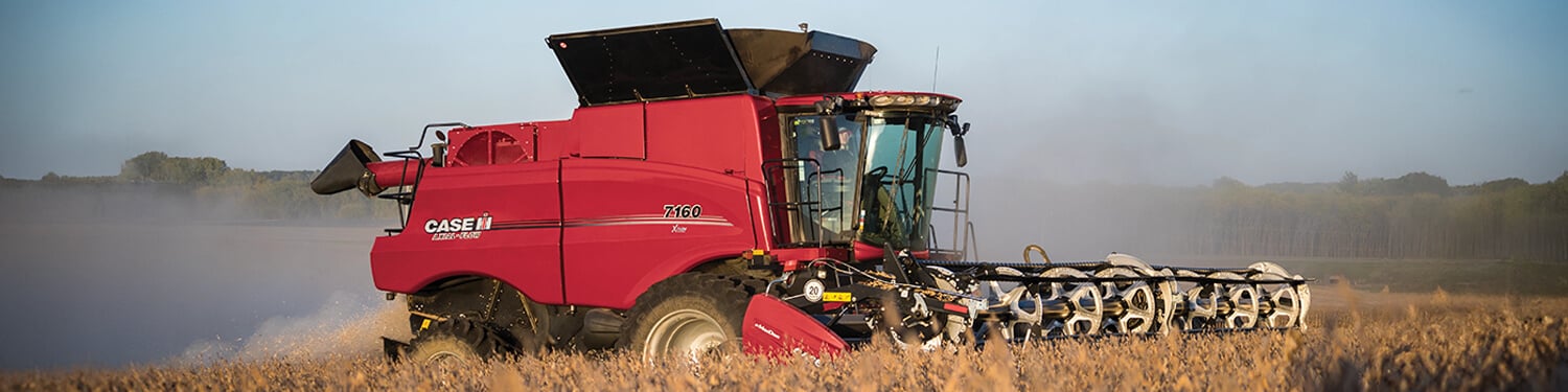 Case IH 7160 combine with Draper head